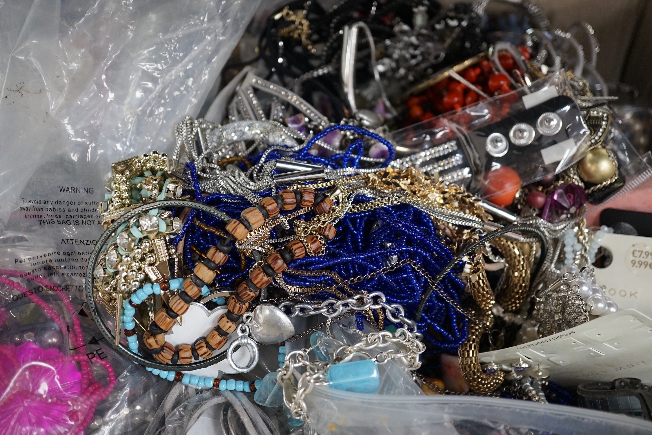 A large quantity of assorted costume jewellery.